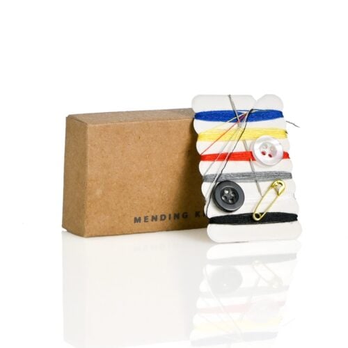 Contemporary Collection mending kit in recycled kraft box for guest sewing emergencies.