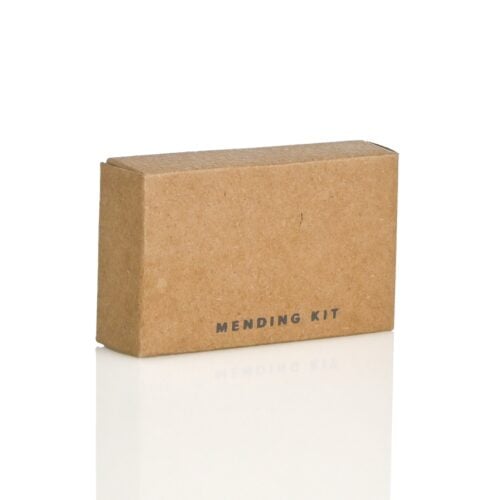 Contemporary Collection mending kit in recycled kraft box for guest sewing emergencies.