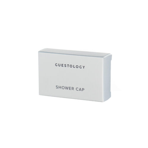 Guestology corn-starch shower cap in recyclable box for boutique hospitality use.